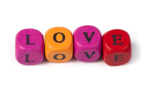 Word love on multicolored wooden cubes — Stock Photo, Image