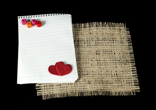 Red hearts and white paper sheet — Stock Photo, Image