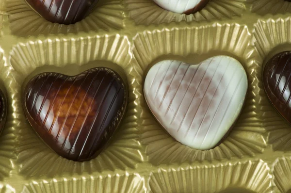 Chocolates em forma de coração — Fotografia de Stock