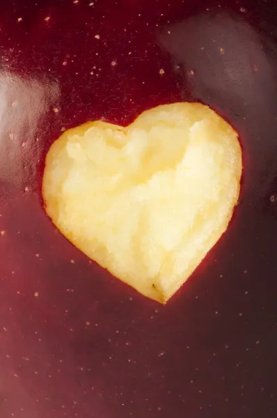 Heart shape closeup carved in apple — Stock Photo, Image