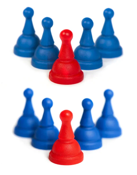 Peones de juego rojo y azul blanco aislado —  Fotos de Stock