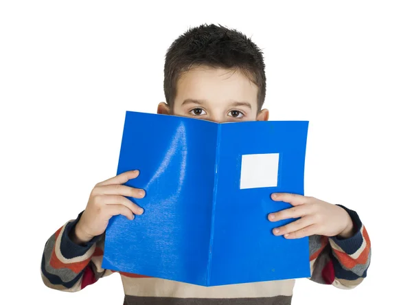 Criança com caderno na frente do rosto — Fotografia de Stock