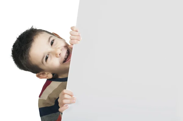 Little boy holding a whiteboard Stock Image