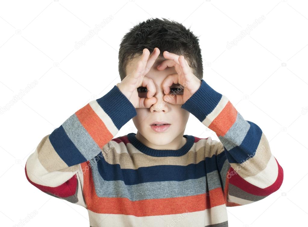 Child looking through his hands