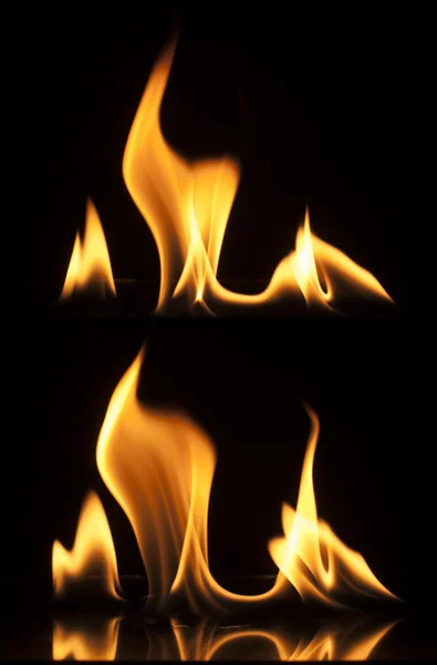 Siyah arkaplanda yangın — Stok fotoğraf