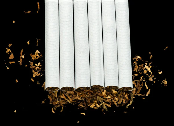 Disposé dans une rangée de cigarettes — Photo