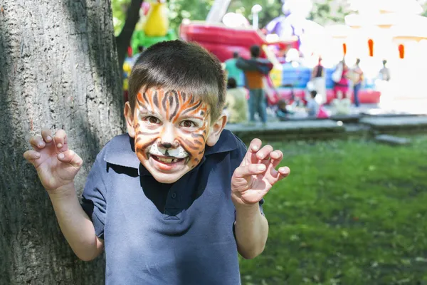 Child with painted face — Stock Photo, Image