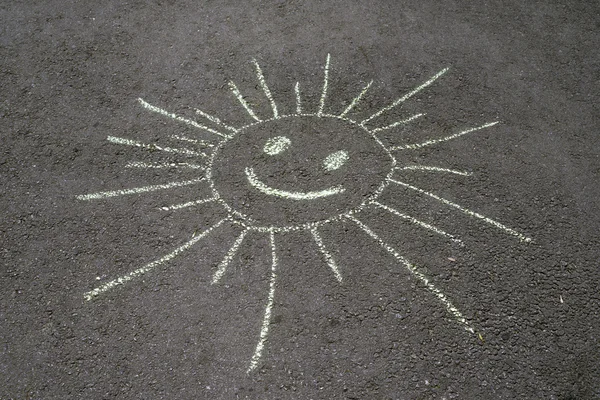 Sole disegno su asfalto — Foto Stock