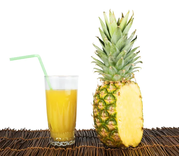 Pineapple and glass of juice — Stock Photo, Image