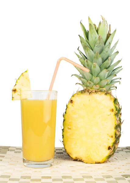 Pineapple and glass of juice — Stock Photo, Image