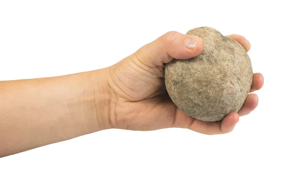 Mão segurando bola de pedra — Fotografia de Stock