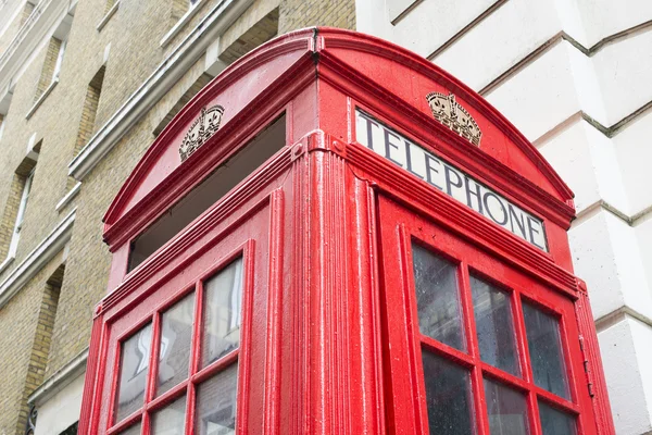 Röd telefon cabine i london. — Stockfoto