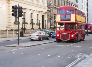 Red vintage bus in London. clipart