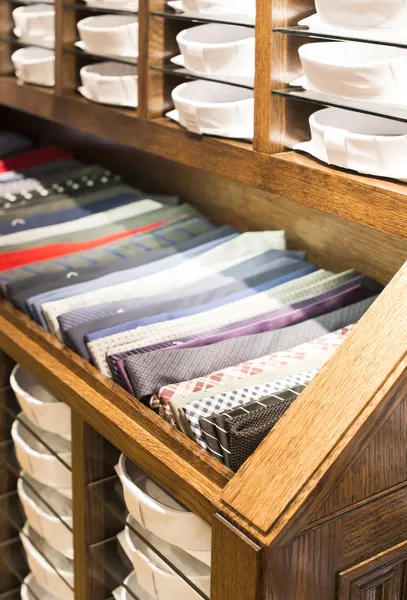 Ties stacked on a shelf in a store — Stock Photo, Image