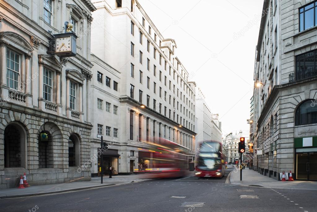 Red Bus in motion in City of London