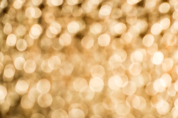 Gold color shiny ornaments bokeh — Stock Photo, Image