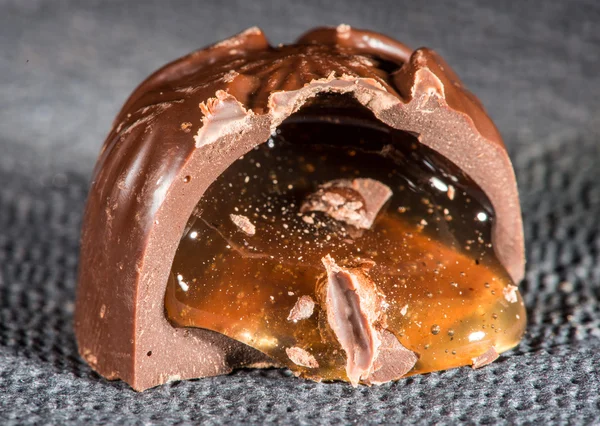 Chocolate bonbon and cream fill — Stock Photo, Image