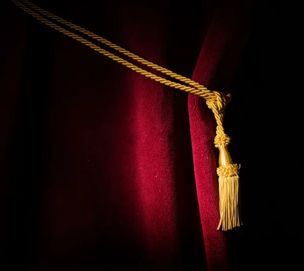 Red velvet curtain with tassel — Stock Photo, Image