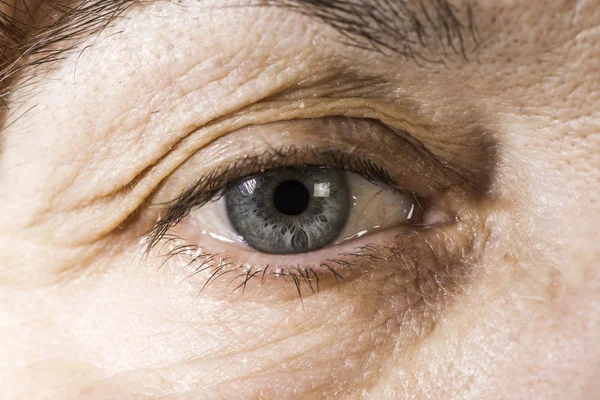 Close up old women eye — Stock Photo, Image