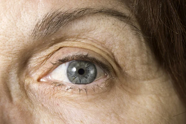 stock image Close up old women eye