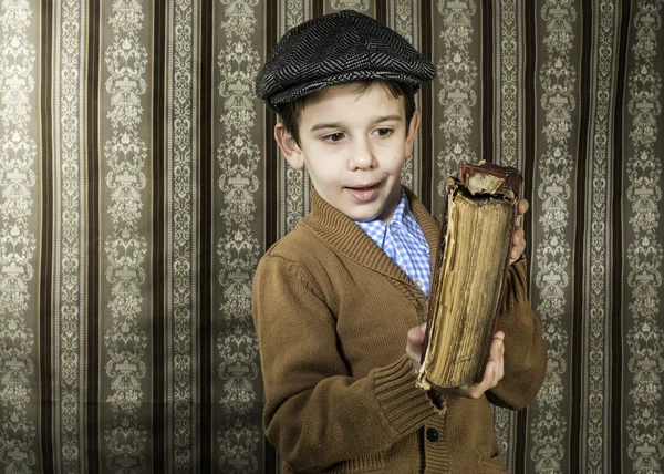 Child with red vintage book — Stock Photo, Image