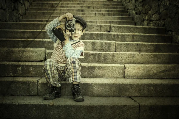 Child with vintage camera — Stock Photo, Image