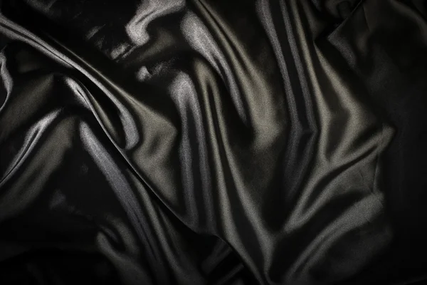 Shiny black satin fabric — Stock Photo, Image