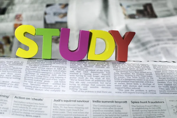 Word study on newspaper page — Stock Photo, Image