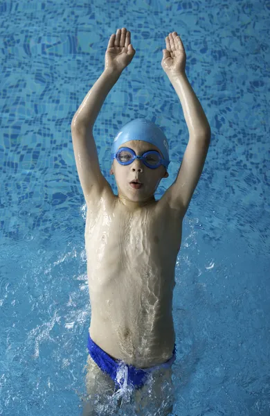 Child swimmer in swimming pool Stock Picture
