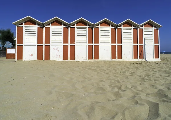 Drewniane domki na plaży — Zdjęcie stockowe