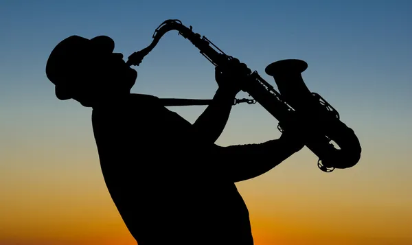 Saxophonist at sunrise — Stock Photo, Image