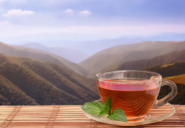 Black tea in mountains — Stock Photo, Image