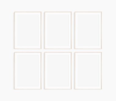 Çerçeve modeli 5x7, 50x70, A4, A3, A2, A1. Altı tane ince, hafif ahşap çerçeve. Galeri duvarı maketi, 6 karelik set. Temiz, modern, minimalist, parlak. Portre. Dikey. Passepartout / mat açılışı 2: 3 çerçeve oranı.