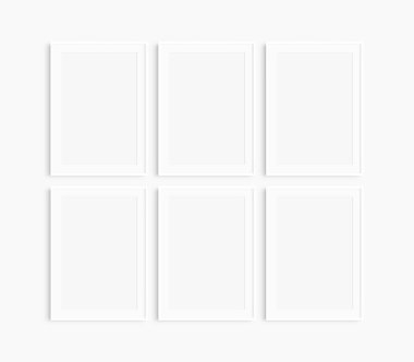 Çerçeve modeli 5x7, 50x70, A4, A3, A2, A1. Altı tane ince beyaz çerçeve. Galeri duvarı maketi, 6 karelik set. Temiz, modern, minimalist, parlak. Portre. Dikey. Passepartout / mat açılışı 2: 3 çerçeve oranı.