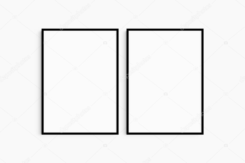 Frame mockup 5x7, 50x70, A4, A3, A2, A1. Set of two thin black frames. Gallery wall mockup, set of 2 frames. Clean, modern, minimalist, bright. Portrait. Vertical.