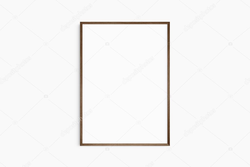 Frame mockup 5x7, 50x70, A4, A3, A2, A1. Single dark brown walnut wood frame mockup. Clean, modern, minimalist, bright. Portrait. Vertical.