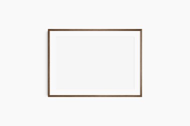 Horizontal frame mockup 7:5, 70x50, A4, A3, A2, A1 landscape. Single dark brown walnut wood frame mockup. Clean, modern, minimalist, bright. Passepartout/mat opening in 3:2 aspect ratio. clipart