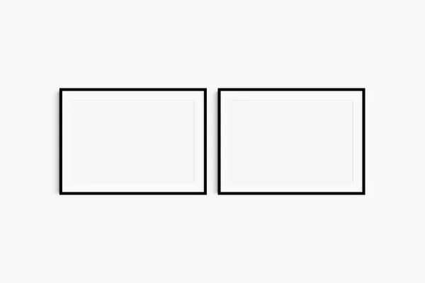 水平框架模型7 70X50 A1景观 一套两个黑色的细框 画廊墙壁模型 设置2帧 3点2分开幕 — 图库照片