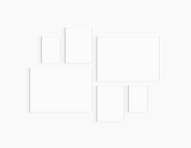 Gallery wall mockup. Set of 6 white frames. Gallery wall frame mockup. Two 70x50 (7:5), two 30x40 (3:4), and two A4 (5:7) white frames. clipart