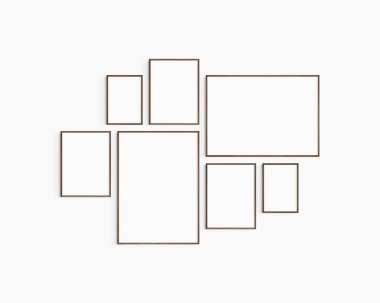 Galeri duvarı modeli. 7 tane koyu ceviz ağacı çerçevesi. Galeri duvarı çerçeve modeli. Bir 50x70 (5: 7), bir 70x50 (7: 5), üç 30x40 (3: 4), ve iki A4 (5: 7) tahta çerçeve.