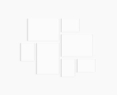 Galeri duvarı modeli. 7 beyaz çerçeve seti. Galeri duvarı çerçeve modeli. Bir 50x70 (5: 7), iki 70x50 (7: 5), iki 30x40 (3: 4), ve iki 40x30 (4: 3) beyaz çerçeve.