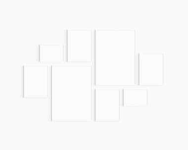 Gallery wall mockup. Set of 8 white frames. Gallery wall frame mockup. Two 50x70 (5:7), four 30x40 (3:4), and two A4 landscape (7:5) white frames. clipart