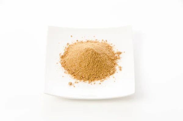 Powdered Brown Sugar Plate White Background — Stock Photo, Image