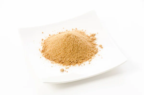 Powdered Brown Sugar Plate White Background — Stock Photo, Image