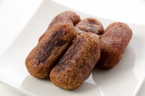 一种冲绳特有的油炸食品 由红薯淀粉和紫色甜土豆制成 — 图库照片