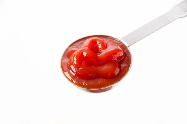 Cuillère Mesurer Sauce Tomate Sur Fond Blanc — Photo