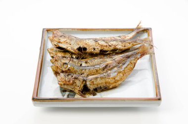 Izgara tuzlu ve kurutulmuş sardalya.