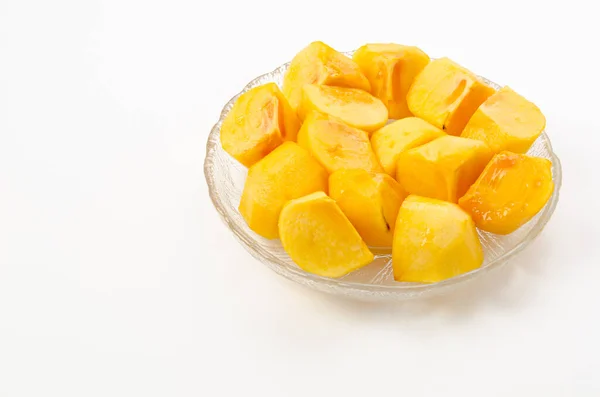 Kaki Delicious Persimmon Slices Transparent Glass Bowl White Background — Stock Photo, Image