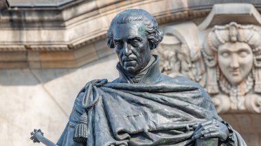 Monument to King Frederick Augustus I of Saxony in front of Supreme Land Court palace in Dresden, Germany, derails, closeup