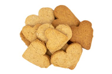 Ev yapımı kahverengi kurabiyeler kalp zencefilli ekmeği sever.